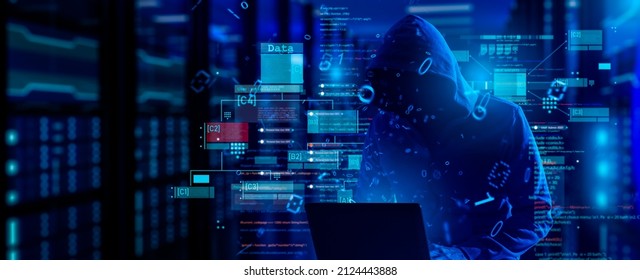 cybersecurity vulnerability Log4J and hacker,coding,malware concept.Hooded computer hacker in cybersecurity vulnerability Log4J on server room background.metaverse digital world technology.