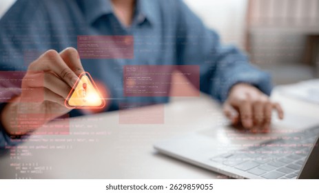 Cybersecurity warning alert system with developer debugging code, data breach protection and threat detection concept, showing exclamation mark symbol on virtual interface.