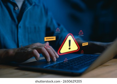 Cybersecurity warning concept with alert signs appearing on a laptop screen, representing system threats, malware, data breaches. Ideal for tech blogs, IT security services and digital risk content.