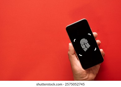Cybersecurity,Digital protection,mobile privacy concept.,Hand holding smartphone with fingerprint recognition, symbolizing biometric security,mobile protection.