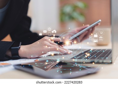 Cyberspace security technology on hands concept. Close up hands of business person using phone and laptop for cloud computing technology with online internet network - Shutterstock ID 2227420283