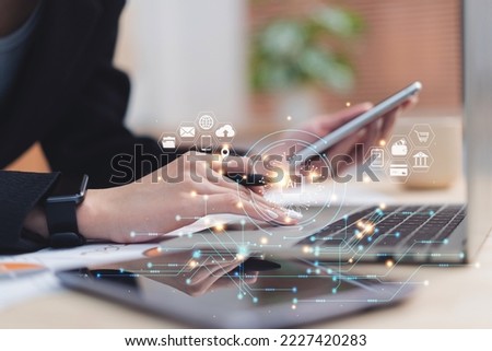 Cyberspace security technology on hands concept. Close up hands of business person using phone and laptop for cloud computing technology with online internet network