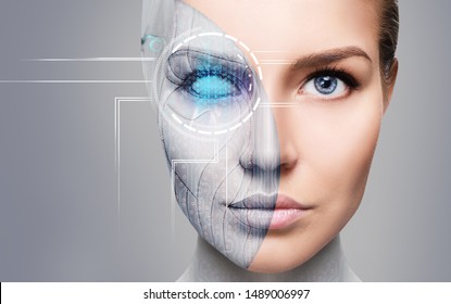 Mujer ciborg con una máquina parte de su cara. Sobre fondo gris.