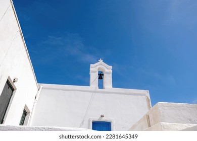 Cyclades, Greece. Small white church and belfry against blue sky, sunny day. Kea island - Shutterstock ID 2281645349