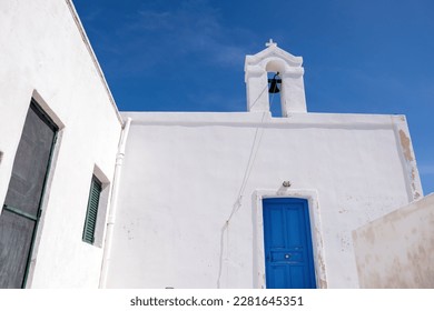 Cyclades, Greece. Small white church and belfry against blue sky, sunny day. Kea island - Shutterstock ID 2281645351
