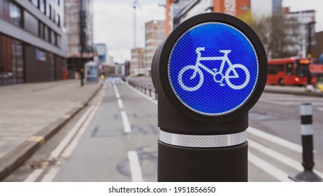 Cycle Route Sign On A Bollard In A City Centre