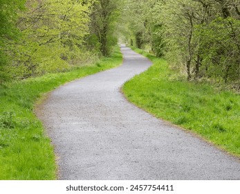 Cycle and walk path in countryside built on old railway line - Powered by Shutterstock