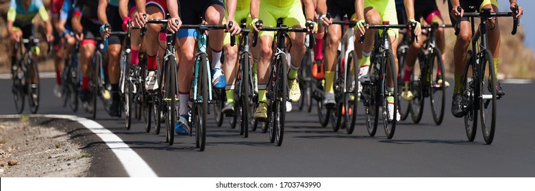 Cycling Competition,cyclist Athletes Riding A Race, The Peloton Climbing The Mountain