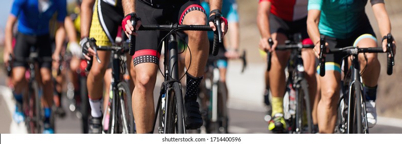 Cycling Competition,cyclist Athletes Riding A Race, The Peloton Climbing The Mountain