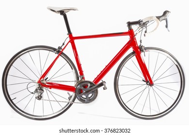 Cycling Concept. Professional Carbon Fiber Road Bike Isolated Over White Background. Horizontal Image Composition