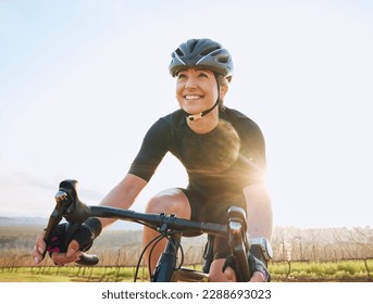 Cycling, fitness and happy with woman in park for training, workout and cardio health. Exercise, travel and freedom with female cyclist riding on bike in nature for adventure, journey and transport - Shutterstock ID 2288693023