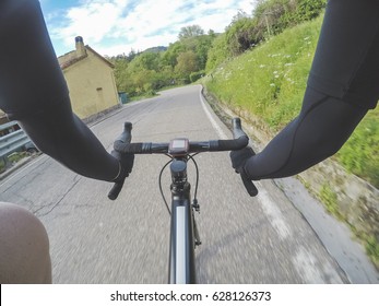 Cycling Pov. Personal Perspective Shot Of A Cyclist Riding A Racing Bicycle. Descending.