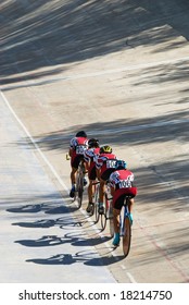 Cycling Team Racing On Velodrome