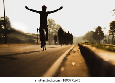 Cycling Is Training As A Group, In The Morning He Pretends To Finish Line.