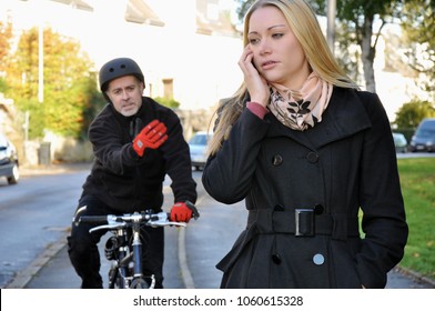 Cyclist Is Angry Because Pedestrian Walks On Bike Path