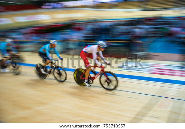 cyclist, cycling\
track, velodrome -\
abstract