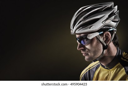 Cyclist. Dramatic close-up portrait - Powered by Shutterstock