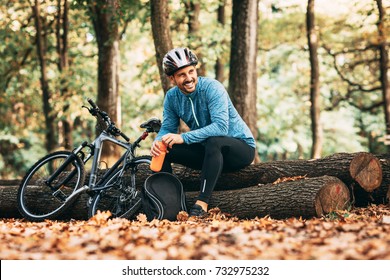 Cyclist in forest.