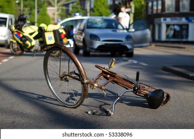 Cyclist Hit By Car. Paramedics And Police On Scene.