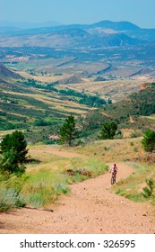 Cyclist Mountain Biking In Colorado