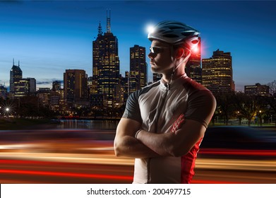 Cyclist At Night With Bike Lights On His Helmet