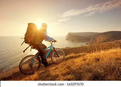 cyclist on a mountain bike travels around the beautiful landscape