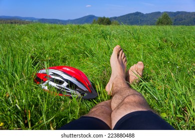 Cyclist Relax. Man Feet Closeup Of Cyclist Relaxing On Hill Enjoying Sun On Sunny Summer Day In A Mountains. Poland, Bieszczady.