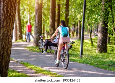 Cyclist Ride On The Bike Path In The City Park
