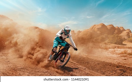 Cyclist riding a bicycle. Downhill. - Shutterstock ID 1144021091