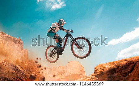 Cyclist riding a bicycle. Downhill.