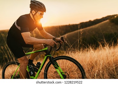 Cyclist Riding A Bike Uphill