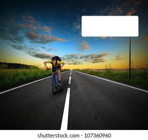 Cyclist riding on the road with a pointer