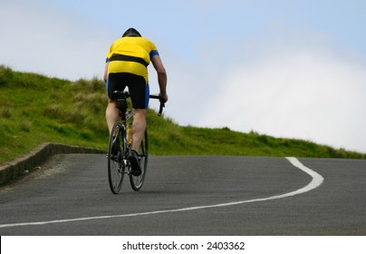 Cyclist Riding Uphill