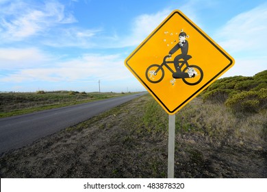 Cyclist Road Sign With Bullet Holes