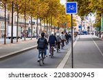 Cyclists on the bike path along the Seine in Paris. France