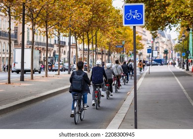 Cyclists on the bike path along the Seine in Paris. France - Powered by Shutterstock