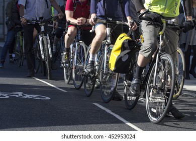 Cyclists On A Cycle Path In London, England