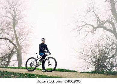 Cyclists preparing for training. Bad weather. - Powered by Shutterstock