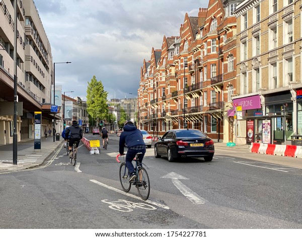 Cyclists using temporary cycle lanes in Hammersmith\
London UK June 2020
