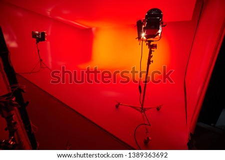 the cyclorama in a Studio lit with red light