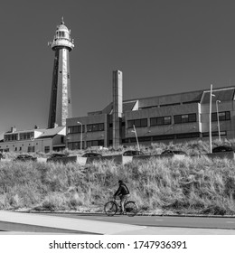 Cycylist passing the lighthouse, Scheveningen