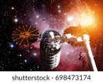 The Cygnus spacecraft in open space. Elements of this image furnished by NASA.