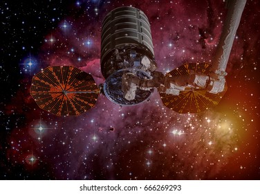 The Cygnus spacecraft in open space. Elements of this image furnished by NASA.