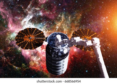 The Cygnus spacecraft in open space. Elements of this image furnished by NASA.