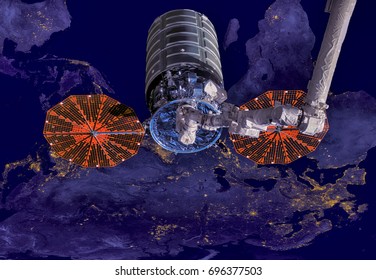 The Cygnus spacecraft in open space. Elements of this image furnished by NASA.