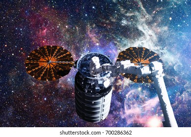 The Cygnus spacecraft in open space. Elements of this image furnished by NASA.