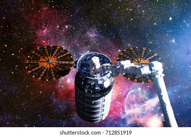 The Cygnus spacecraft in open space. Elements of this image furnished by NASA.