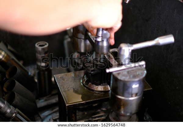 The cylinder polisher or boring cylinder of a\
motorcycle engine.
