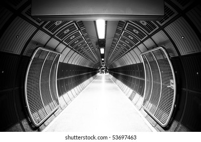 Cylindric tunnel for pedestrians, monochrome toned. - Powered by Shutterstock