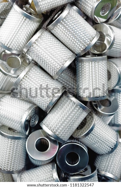 A lot of cylindrical new clear oil filters for\
automobile engine